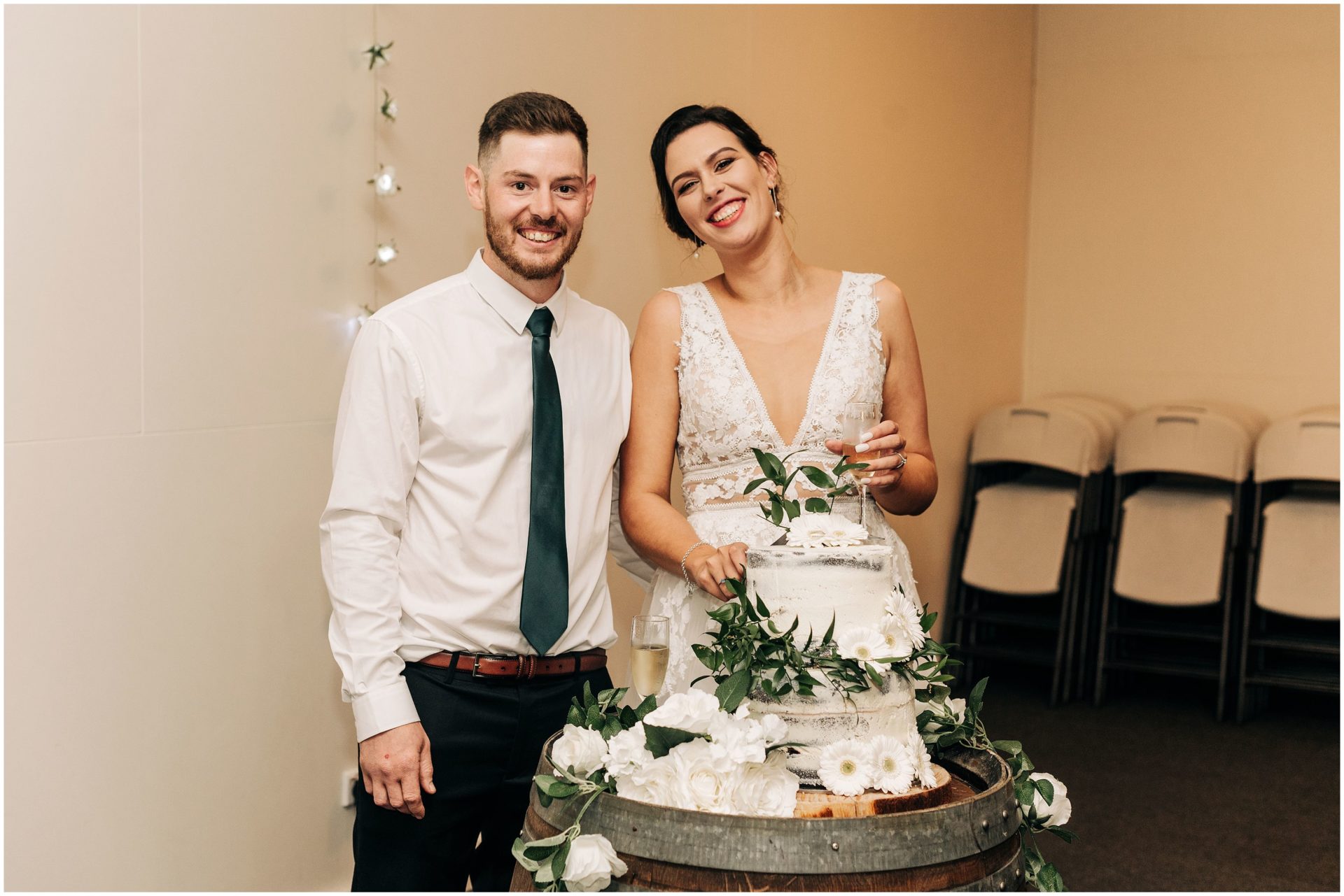 bride groom cut cake neutral white greenery christchurch wedding omarino 