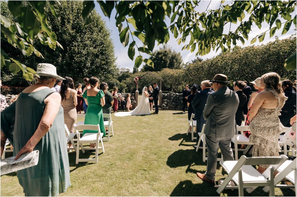wedding ceremony location under tree at hideaway 201 near invercargil and winton in new zealand in summer