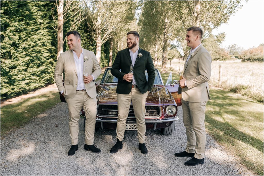 groom groomsmen olive green linen beige suits ellie haines loving ellies belly wedding photographer christchurch 
