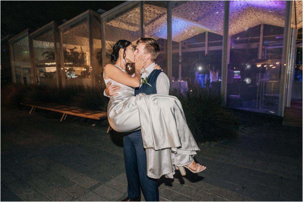 bride groom kiss in dark outside wedding ilex christchurch botanic gardens reception CBD city 